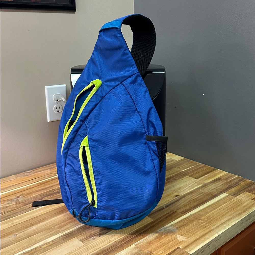 Blue Sling Backpack with Neon Accents